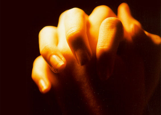 Hands Folded In Prayer